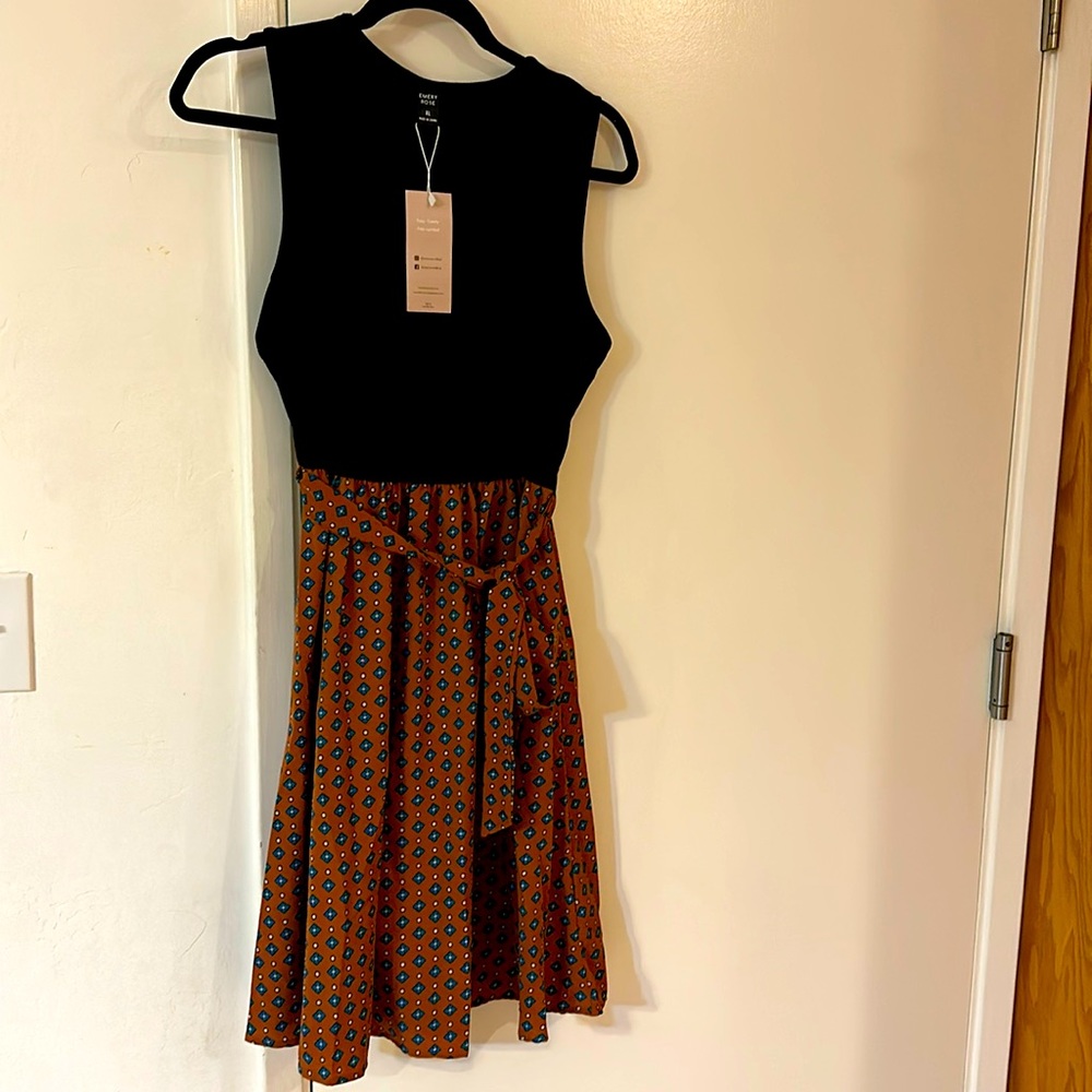 Emery Rose XL dress. Top part black cotton material. Bottom is polyester.